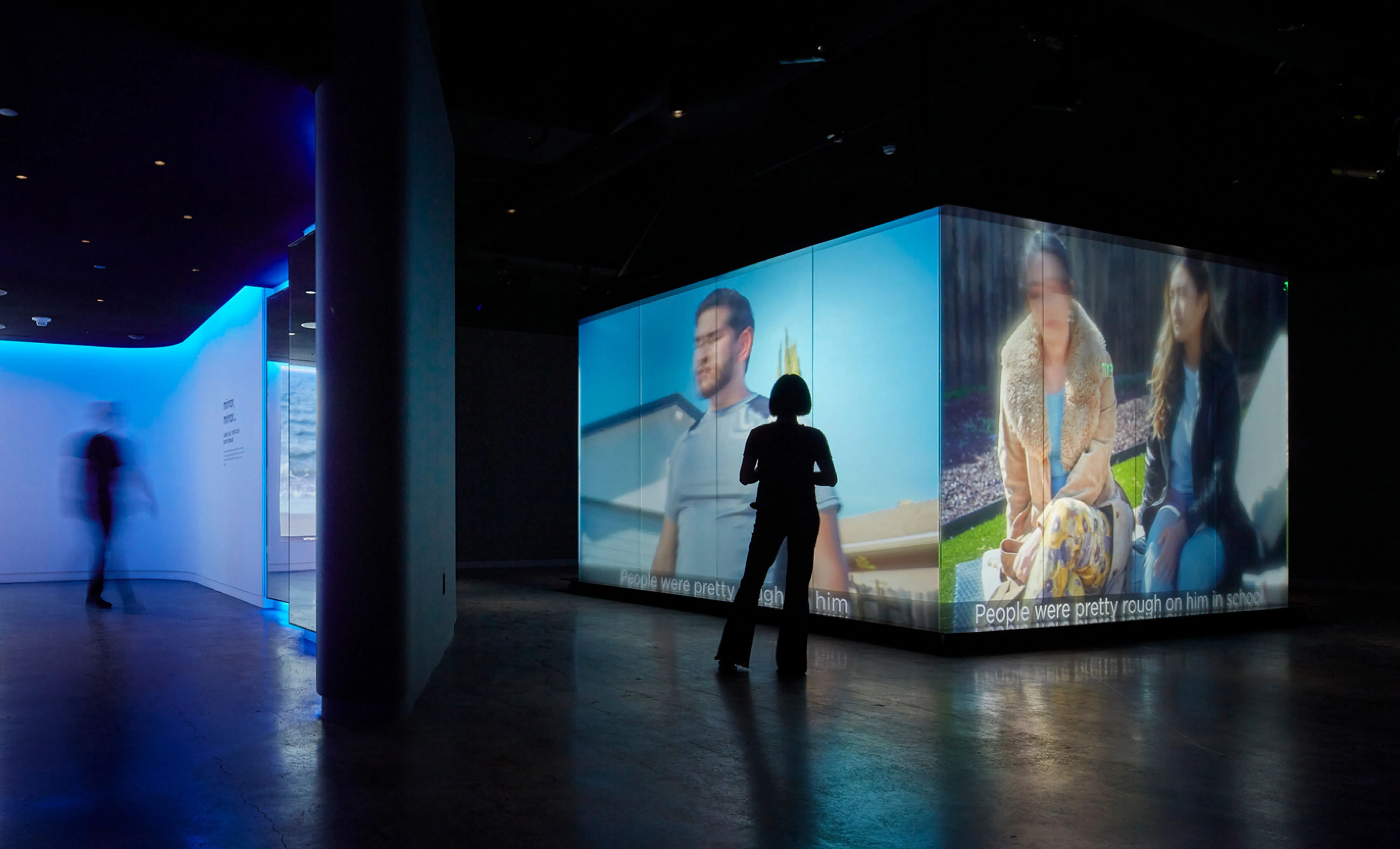 Visitors watching POV projection at Museum of Tolerance in LA.